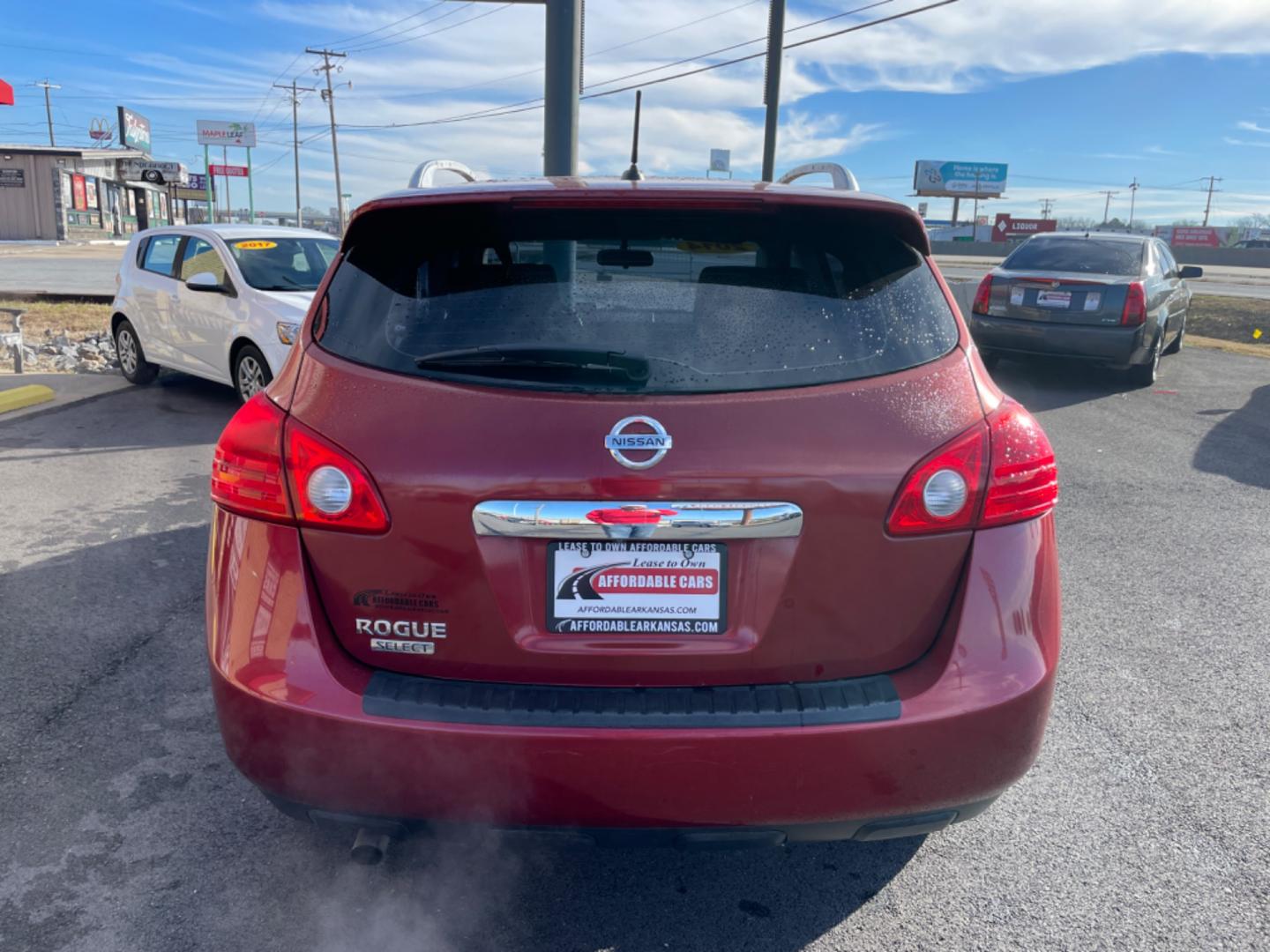 2014 Maroon Nissan Rogue Select (JN8AS5MTXEW) with an 4-Cyl, 2.5 Liter engine, Automatic, CVT transmission, located at 8008 Warden Rd, Sherwood, AR, 72120, (501) 801-6100, 34.830078, -92.186684 - Photo#6